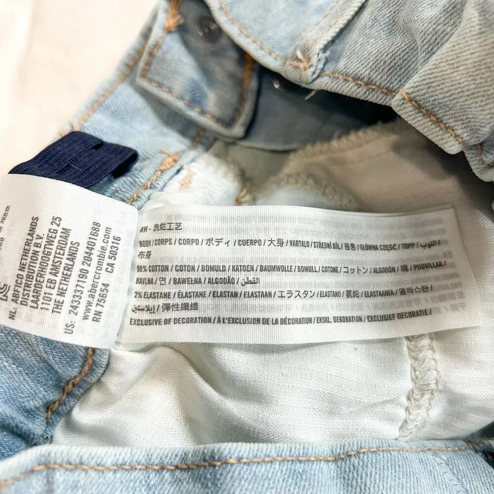 NWOT Abercrombie Kids Light Wash Denim Button Front Mini Skirt Size 11/12
